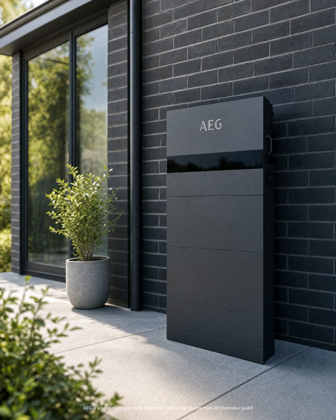 AEG EcoHome battery mounted on a house facade